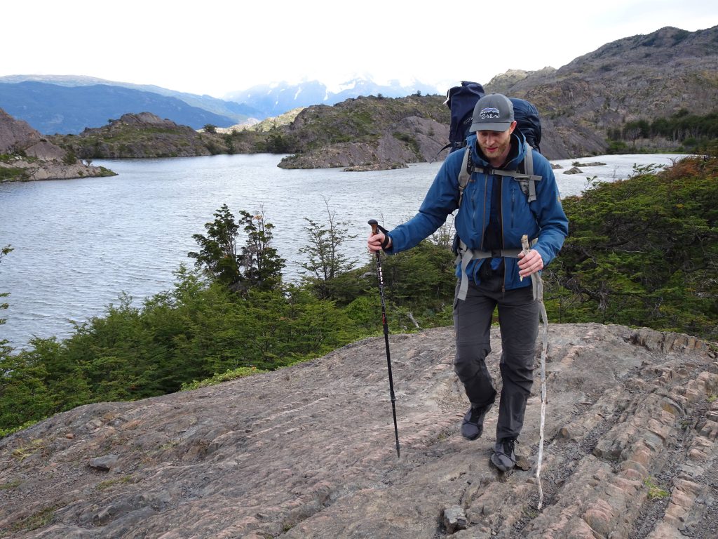 hiking with trekking poles in Torres del Paine National Park Chile